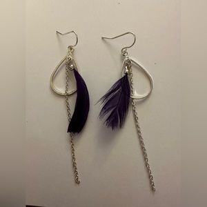 Purple feather earrings with silver oval hoop